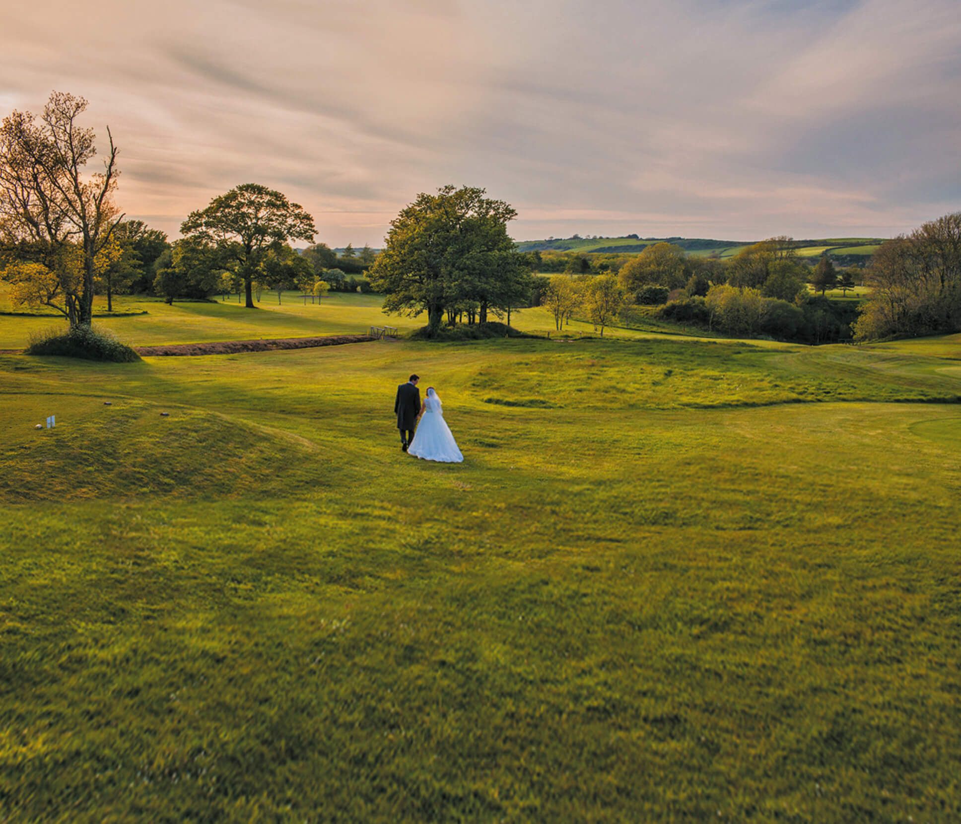 TrefloyneWeddingCoupleOnGolfCourse.jpg